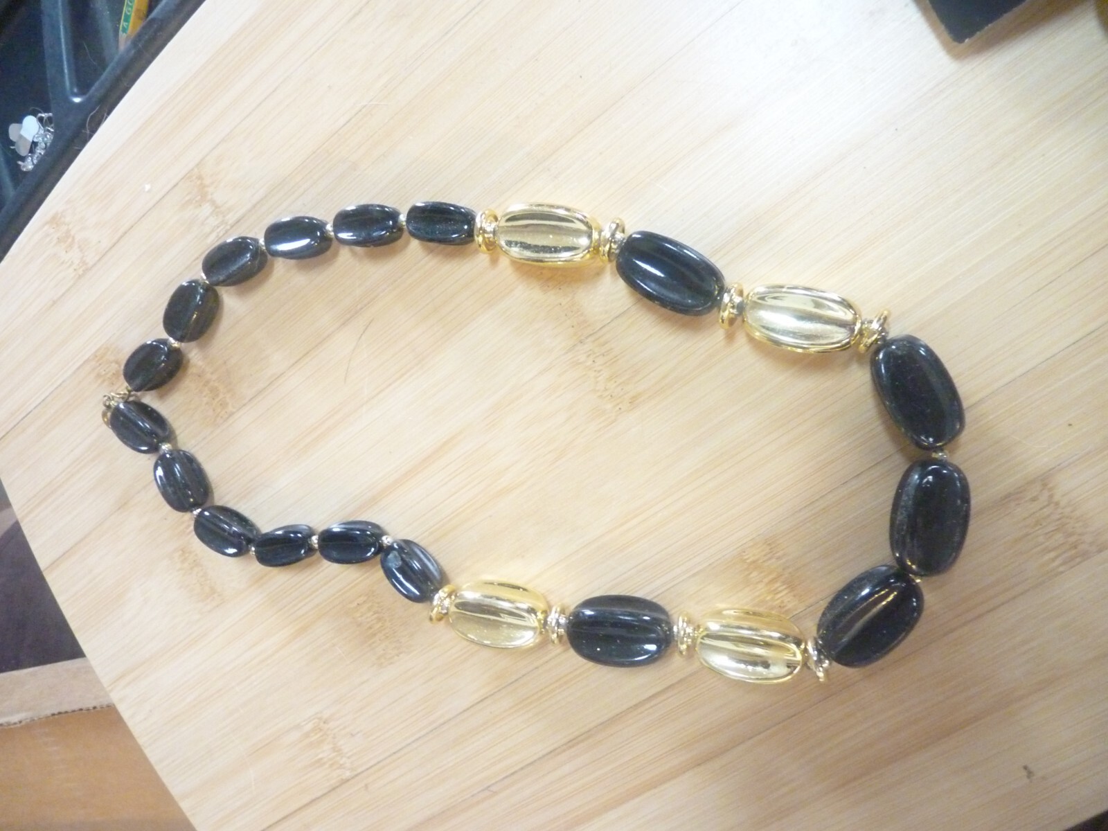 Black and Gold Wrapped Candy Necklace 22.5 inches long