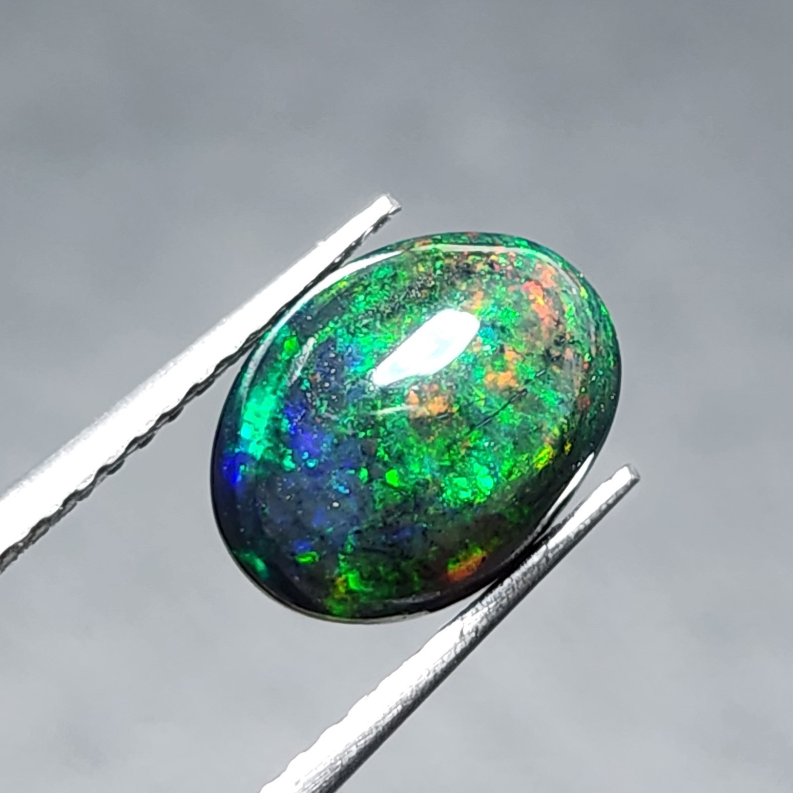 Natural Welo Black Opal Ethiopia Oval Cabochon Vivid Green Fire Gemstone 1.20Ct