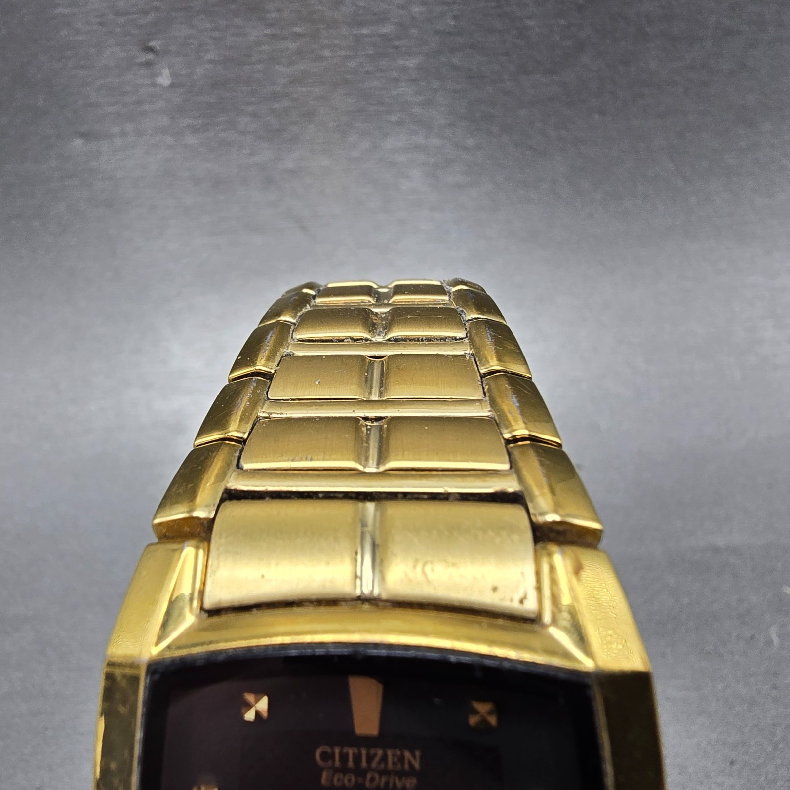 Citizen Eco-Drive Tank Watch Men 31mm Black Dial Gold Date E111-S049369 Runs Jkm