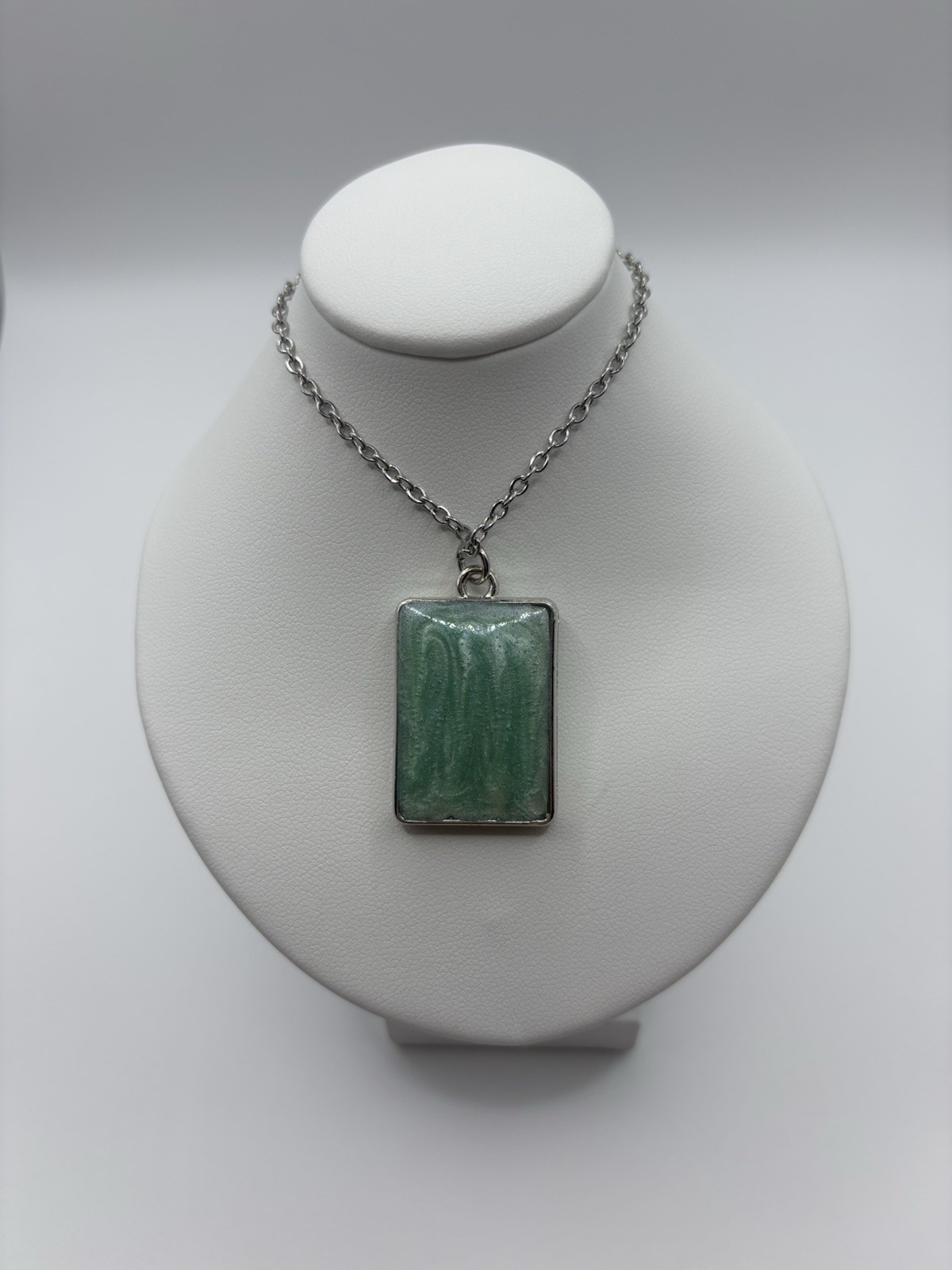 Resin 2 Sided Pendant On A Stainless Steel Oval Chain 22”