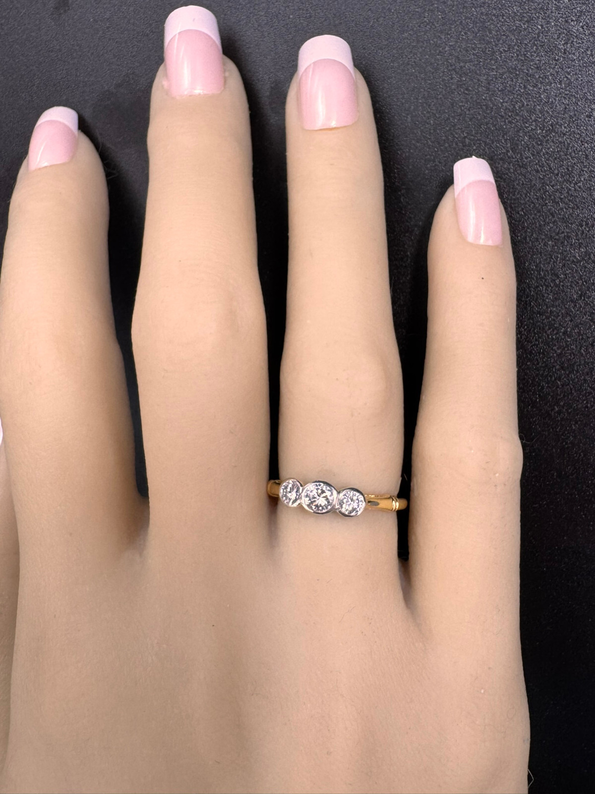 18 ct Yellow and White Gold Diamond Ring, two 0.07ct and a 0.20ct Diamonds