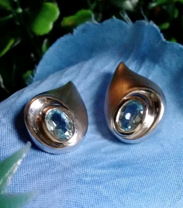 Unique Shape Blue Topaz Post Earrings Set In Satin Finish 925 Sterling Silver