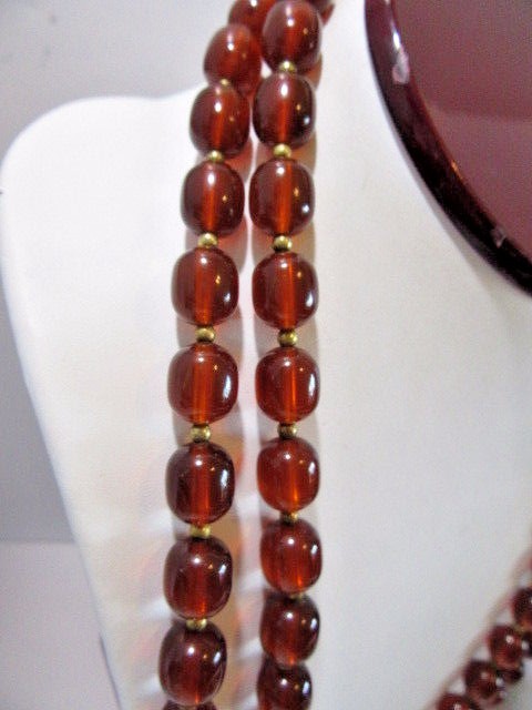 LUCITE SEMI TRANSPARENT TEA BROWN COLOR NECKLACE LONG GOLD TONE SPACERS VINTAGE