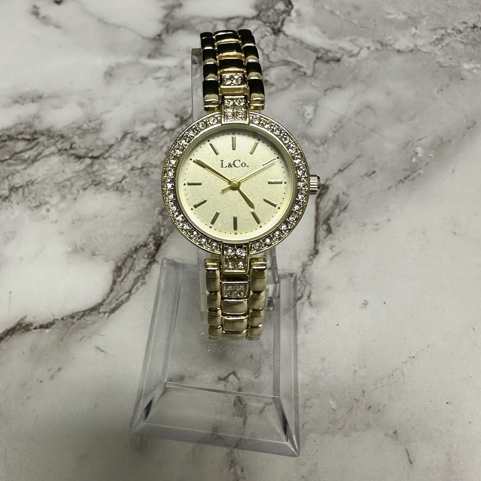 L & Co Watch Women Gold Tone Round Dial Crystal Bezel New Battery 7.25″