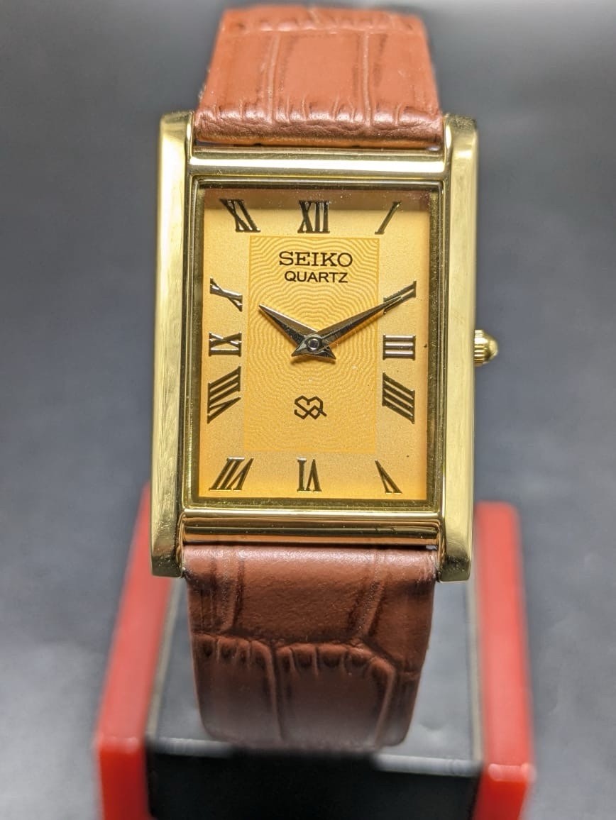 Seiko Quartz Rectangular Green Dial Black Band Roman Numerals Men’s Watch