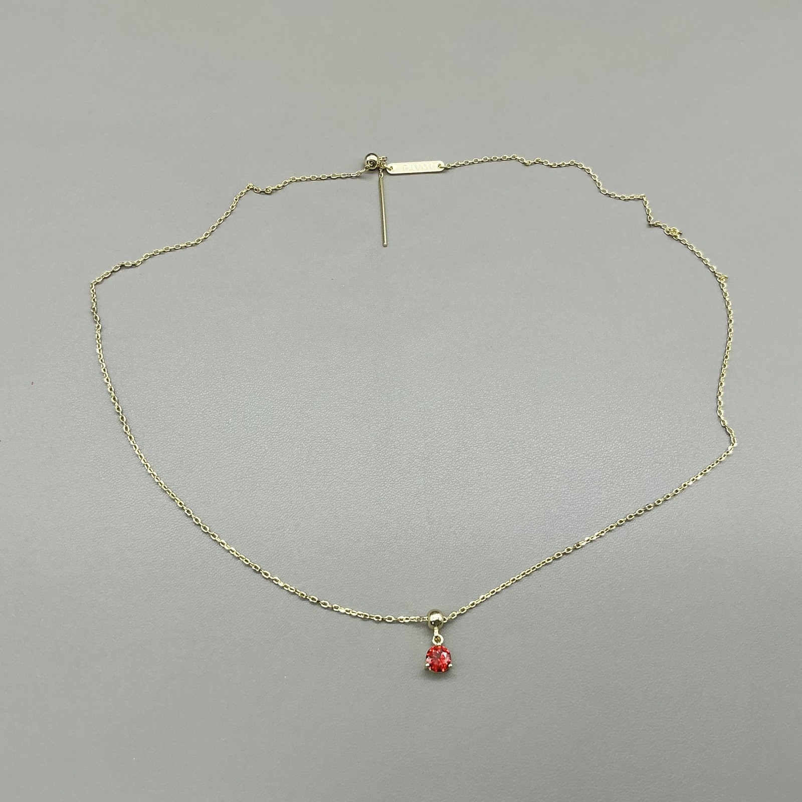 Pavoi Necklace Gold Tone Chain Red Round Stone Pendant Adjustable Slider Womens