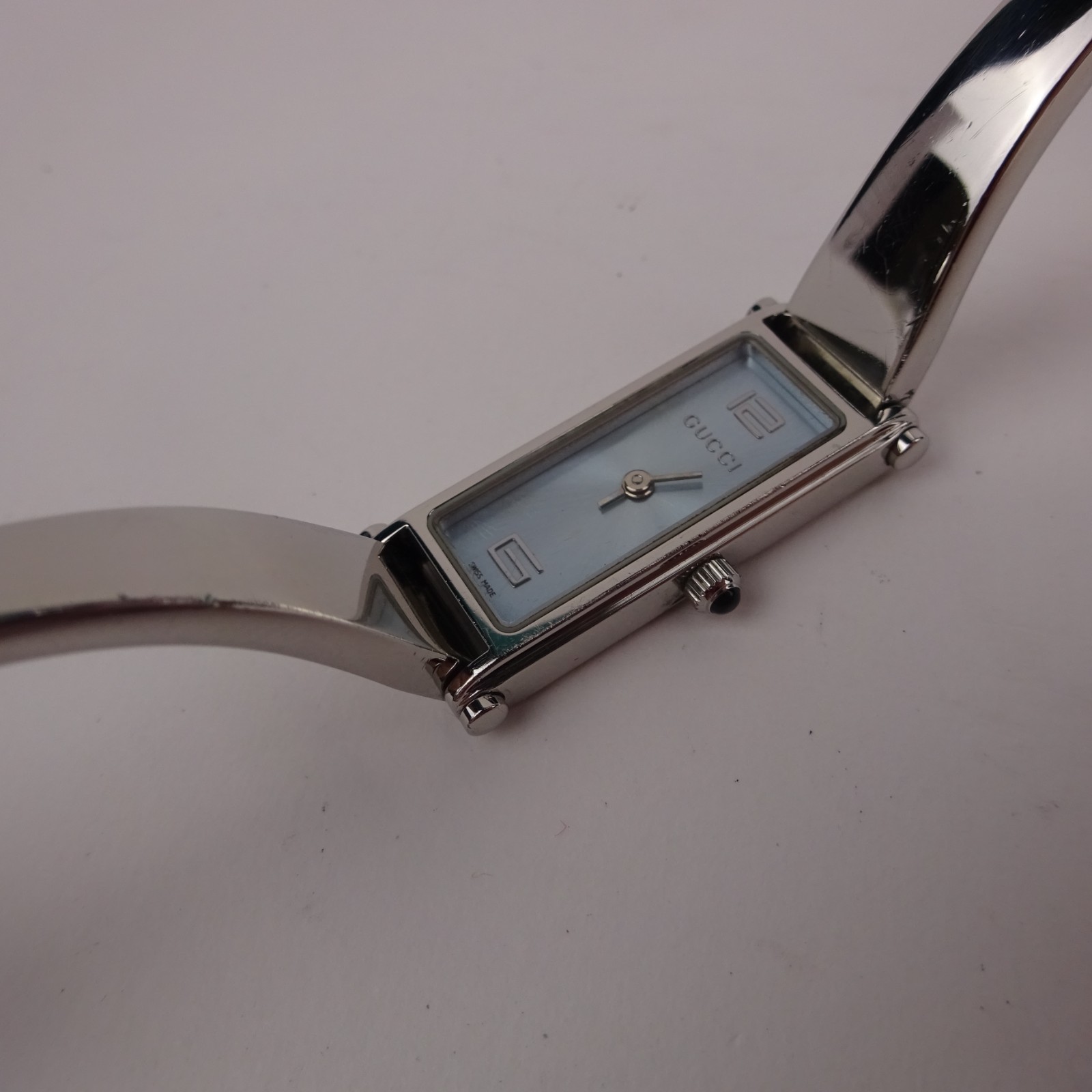 Gucci 1500L Bangle Watch Baby Blue Dial Stainless Steel Women’s