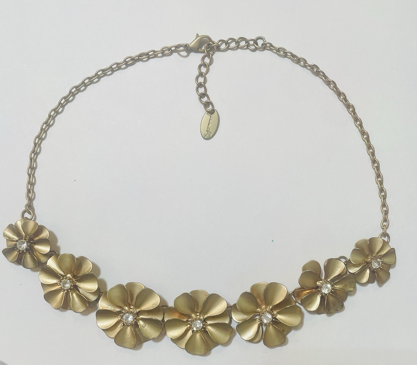 Youmi K sophisticated style Artistian line , known for being hand made signed