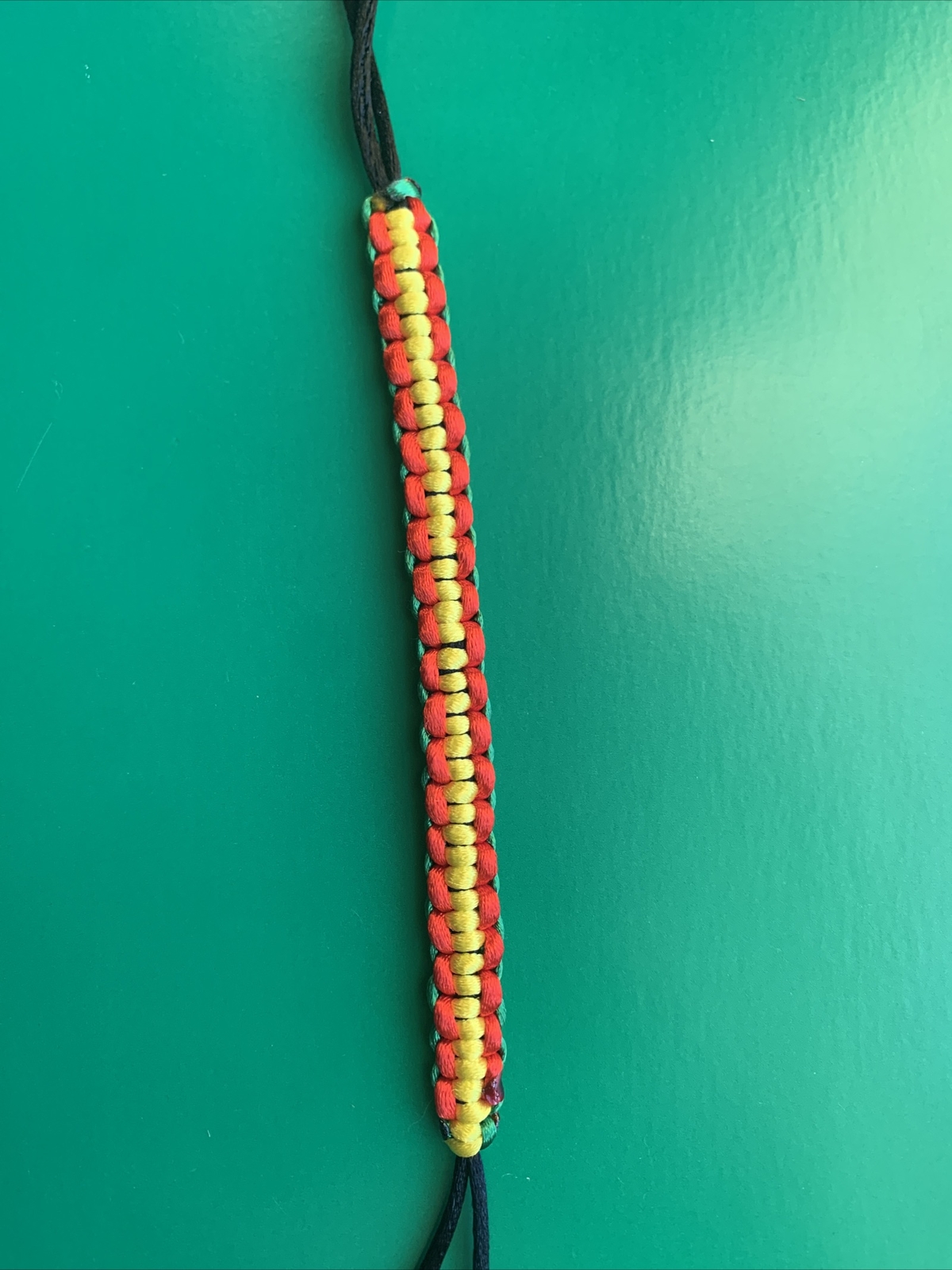 GUYANA Bracelet RED BLACK YELLOW GREEN Satin Rattail Cord Shamballa Nylon