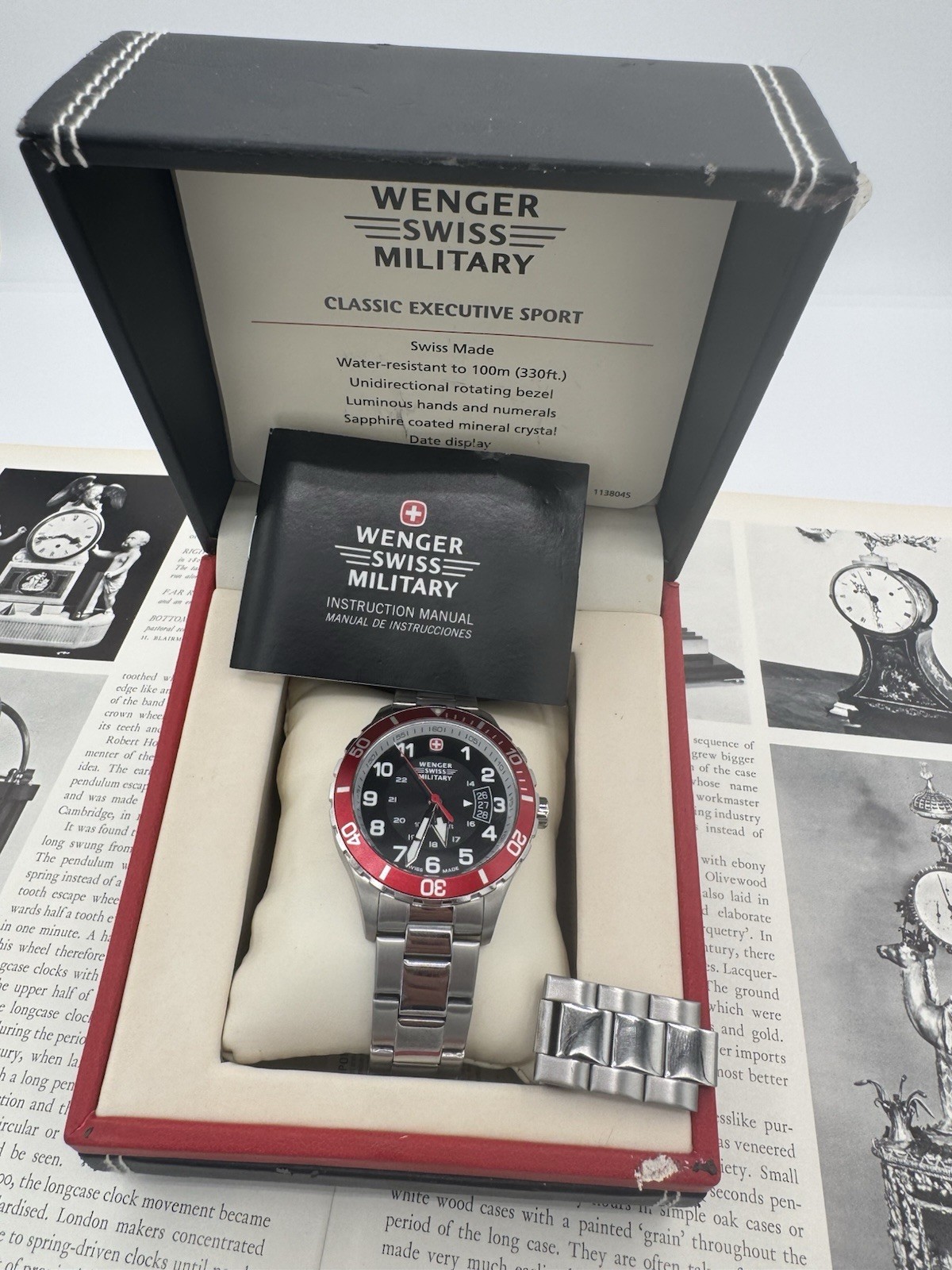 Wenger Swiss Military Men’s Swiss Made Quartz 100m Red Bezel Gray Dial Date