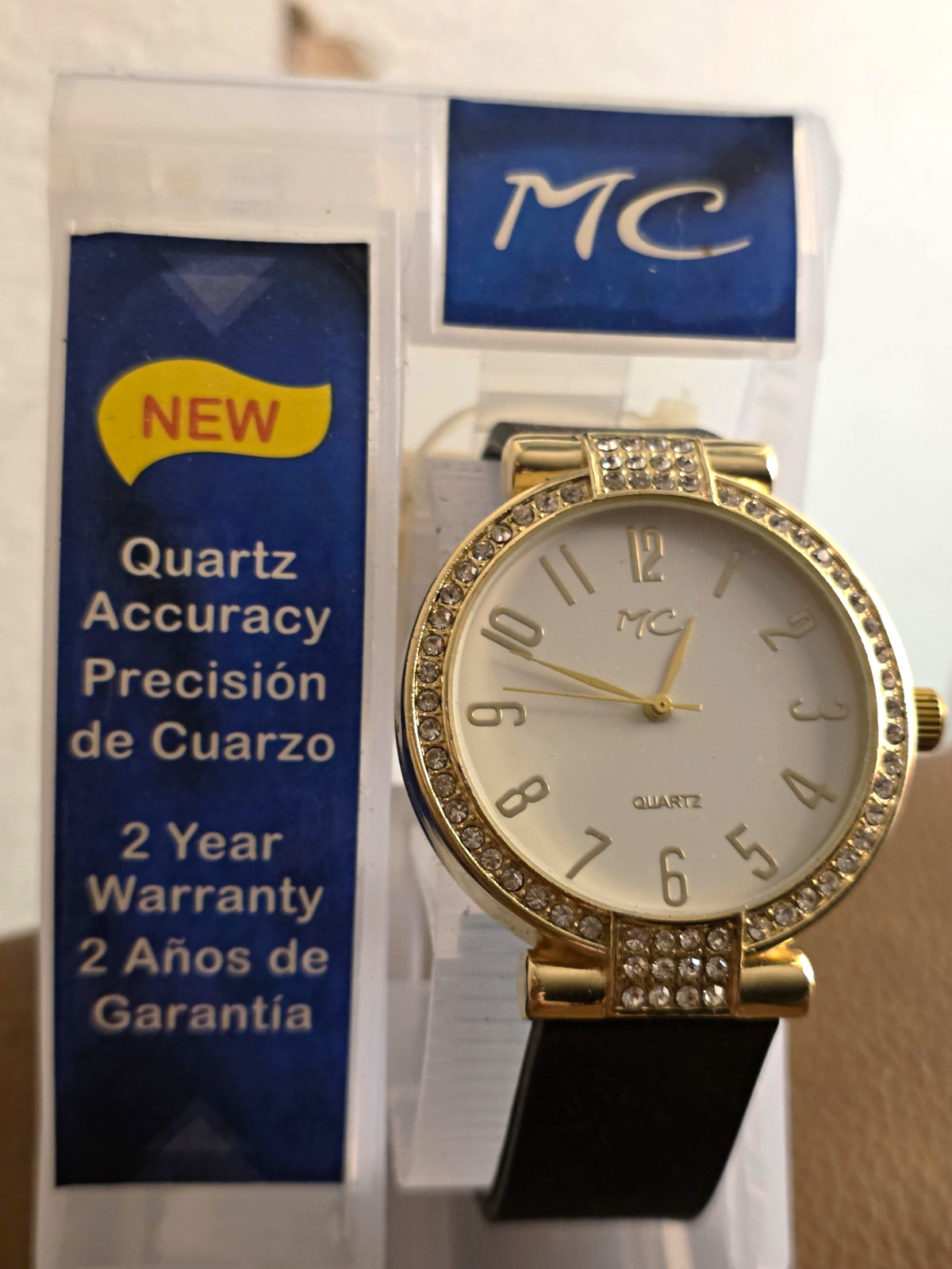 MC Women’s Analog Quartz Watch Gold Tone Diamond Bezel Black Leather Strap Box