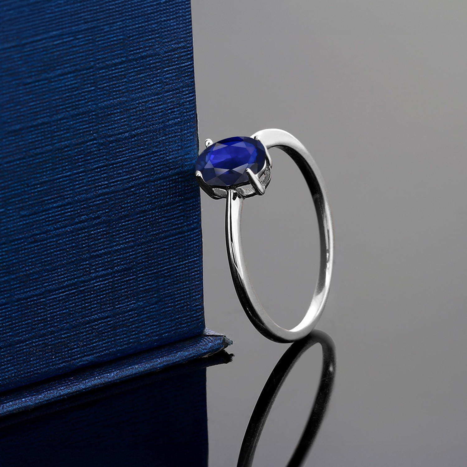 0.57 Ct Oval Blue Sapphire 10K White Gold Ring