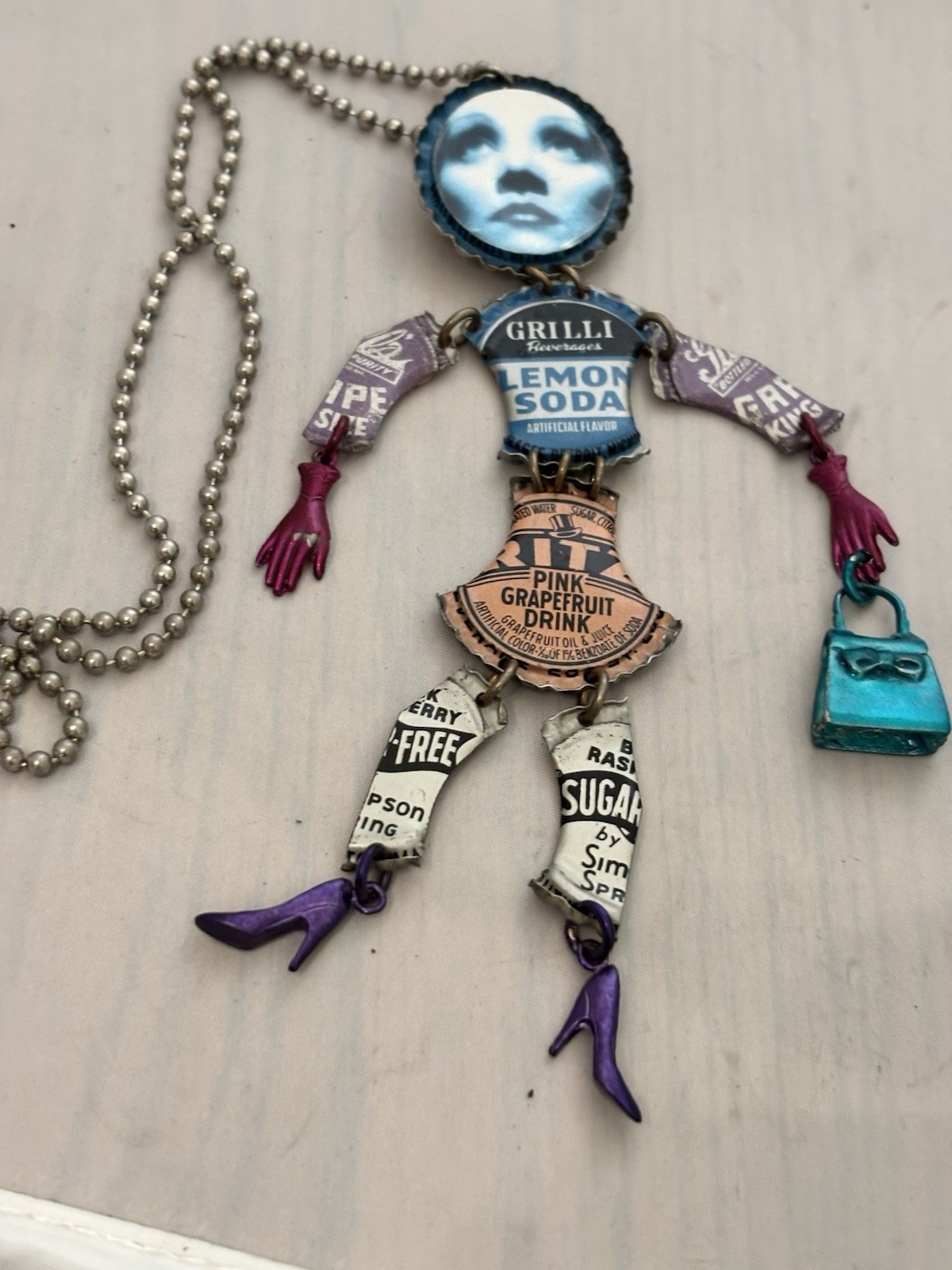 JANET COOPER VINTAGE BOTTLE CAP MARLENE DIETRICH DOLL PIN/PENDENT NECKLACE