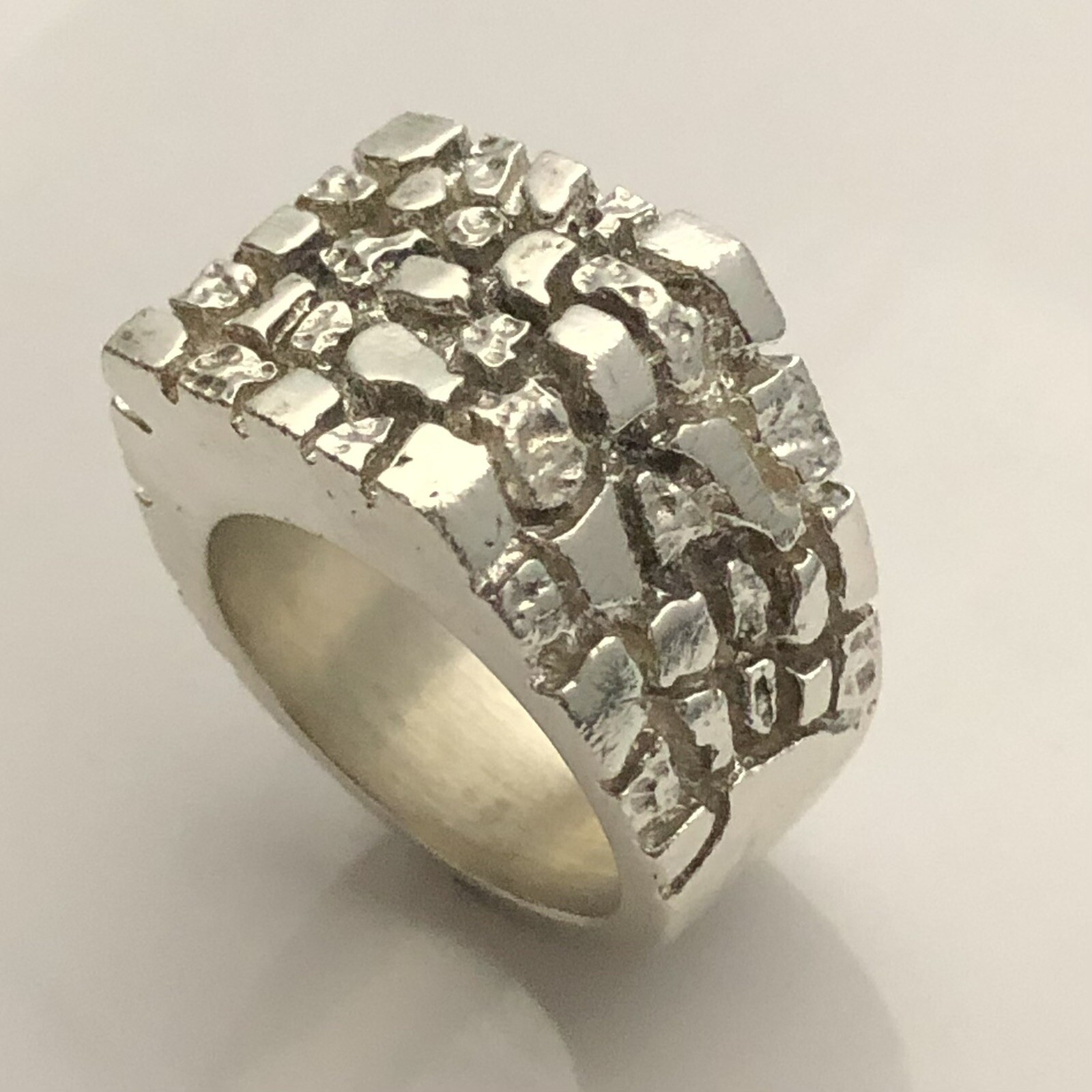 MJG STERLING SILVER . HEAVY NUGGET RING. BIKER. 31 GRAMS. STARTS AT SIZE 9