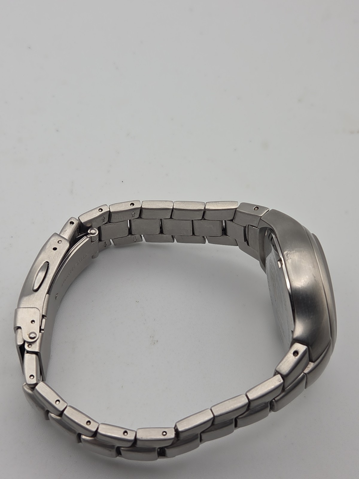 VINTAGE FOSSIL MOVING FLAME STAINLESS STEEL MEN’S WATCH 50 METERS JR-8115