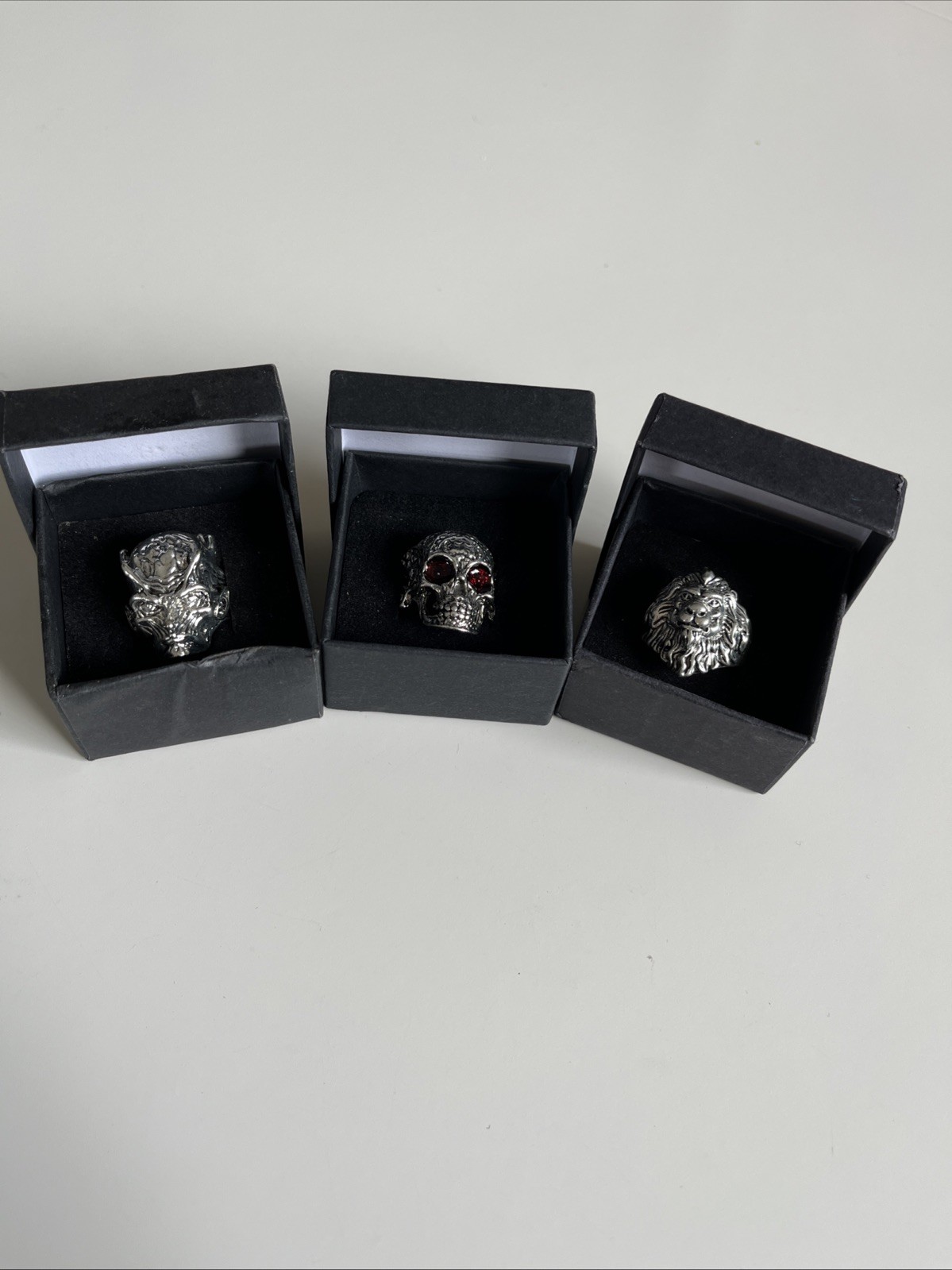 3 Gothic Rings The English Lion, A Red Eyed Skull And A Demon Adjustable