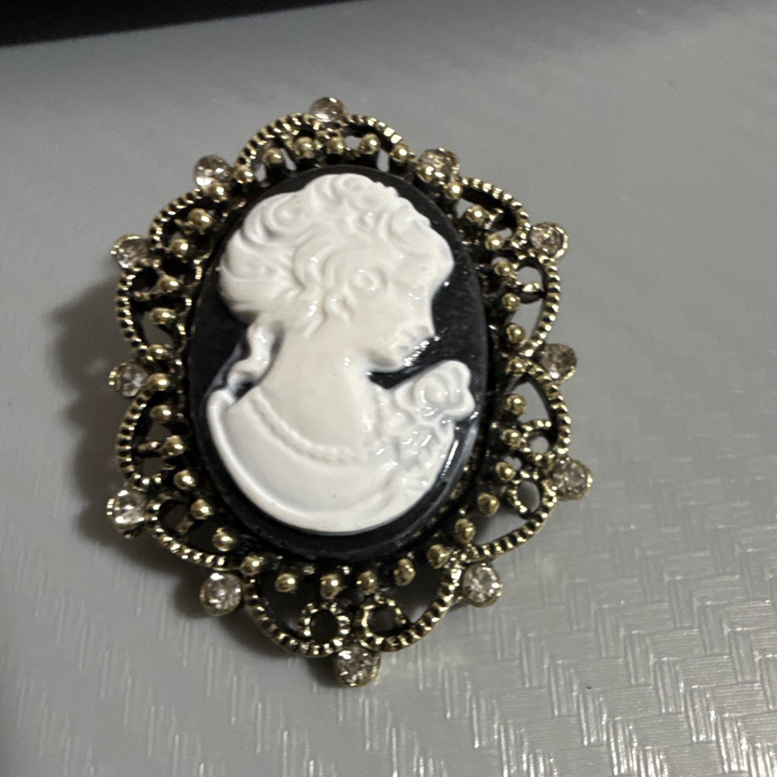 Faux Oval Cameo Portrait Brooch Pin Gold Tone Black/White w Rhinestones