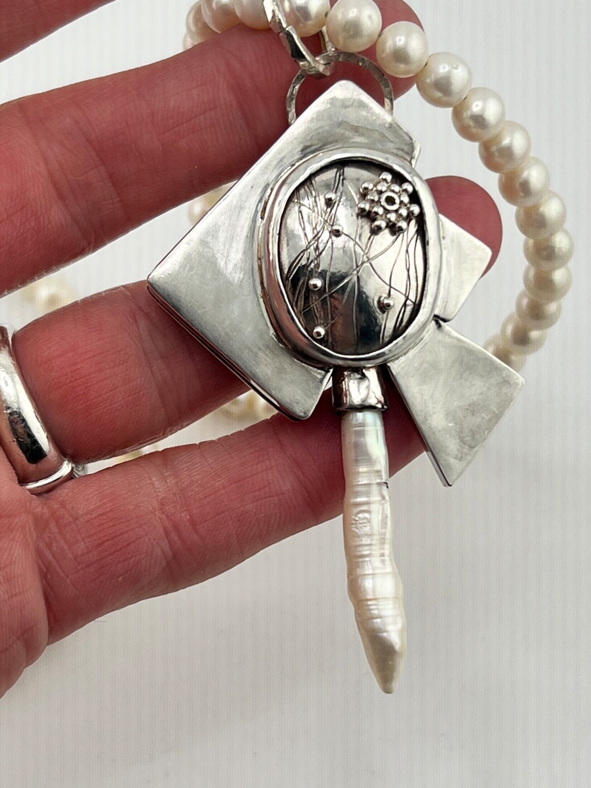 Artisan Pearl necklace 925 Sterling silver hollow form pendant signed FLW