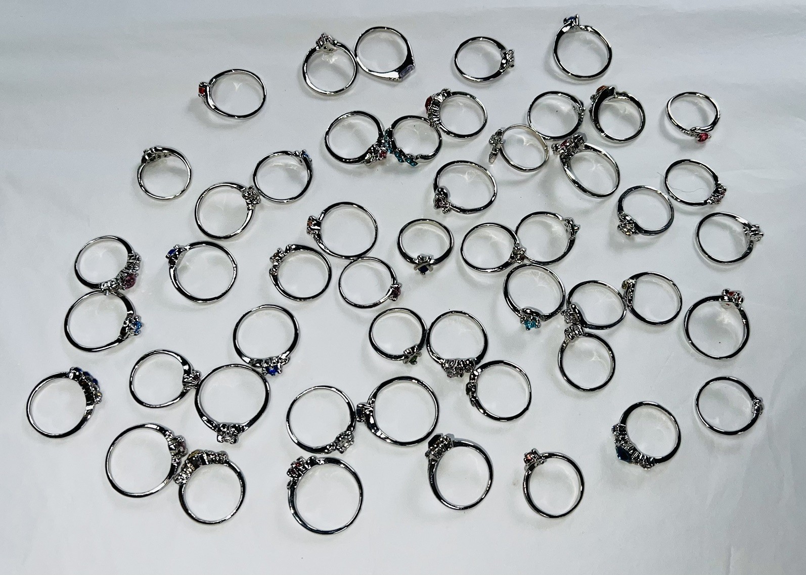 Bundle Of 50 Lovely Silver Coloured Rhinestone RINGS Single & Multiple Gem Stone