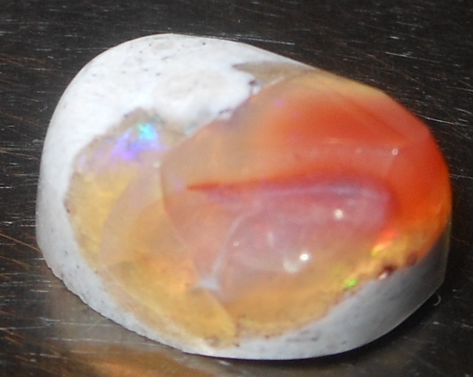 8.70 carats Mexican Fire Opal Freeform shape 15x11x8mm (approx)