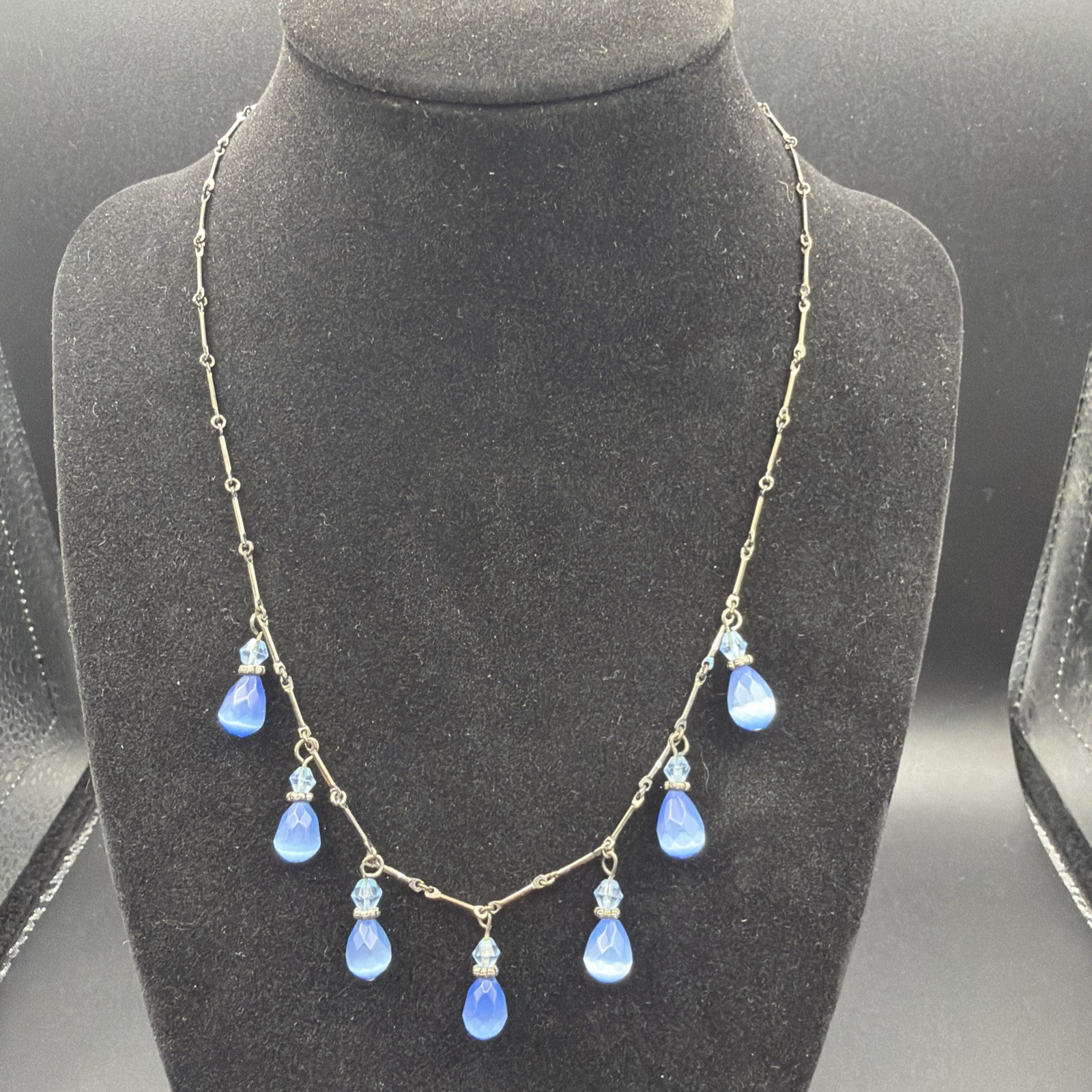 695. Oxidized Gun Metal Chain Pale Blue Satin Glass Teardrop Dangles