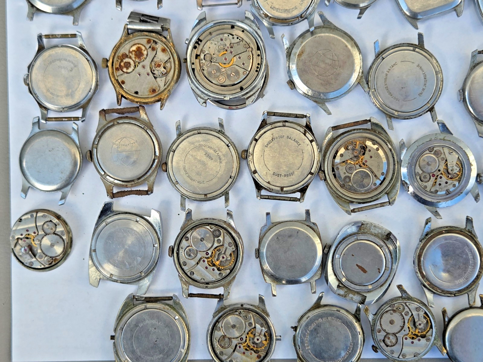 Lot of 75 Russian Watches Vostok Pobeda Mayak Zim etc Not working for parts Read