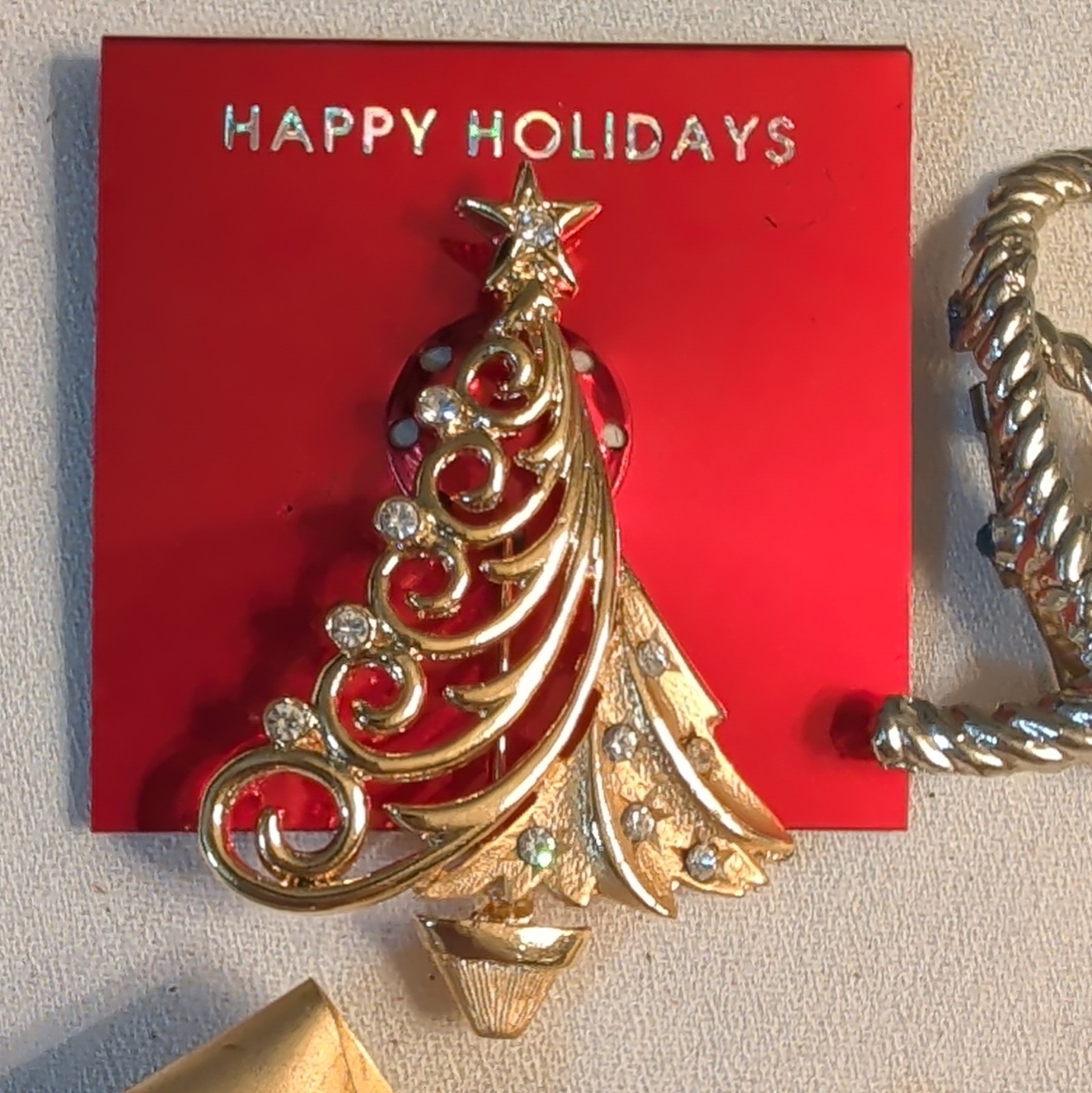 lot of 4 brooches, unmarked gold & silver tone, Christmas tree with rhinestones
