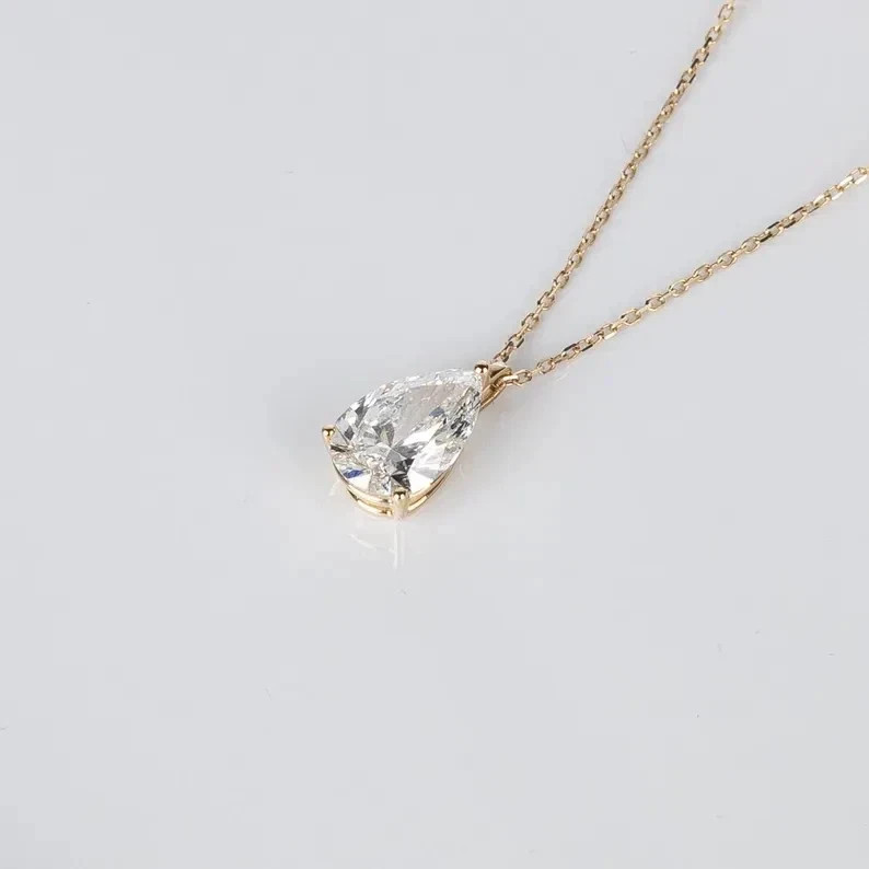 2CT Pear-Cut Moissanite Solitaire Pendant 14K Yellow Gold Plated 18″ Chain