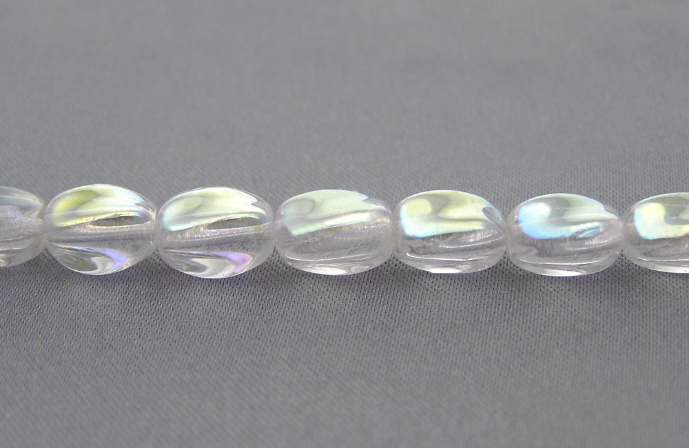 23 Czech Glass Druk Beads 9x7mm Crystal AB twisted oval, pressed, clear AB, P203