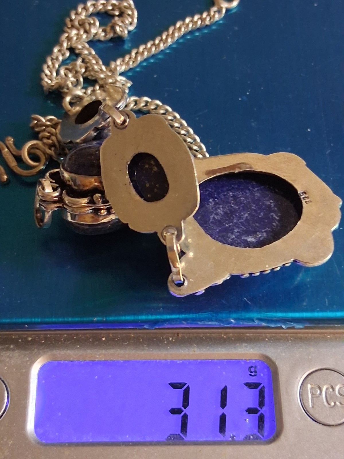 carved lapis lazuli gold filled pendants, sterling silver necklace, total 40g