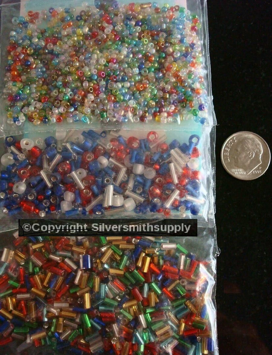 Hundreds of glass seed beads and bugle beads assortment 3 bags of beads gbs046