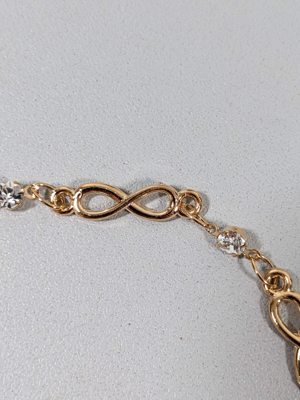 Gold Tone Infinity Clear Crystal Tennis Bracelet 10 inches