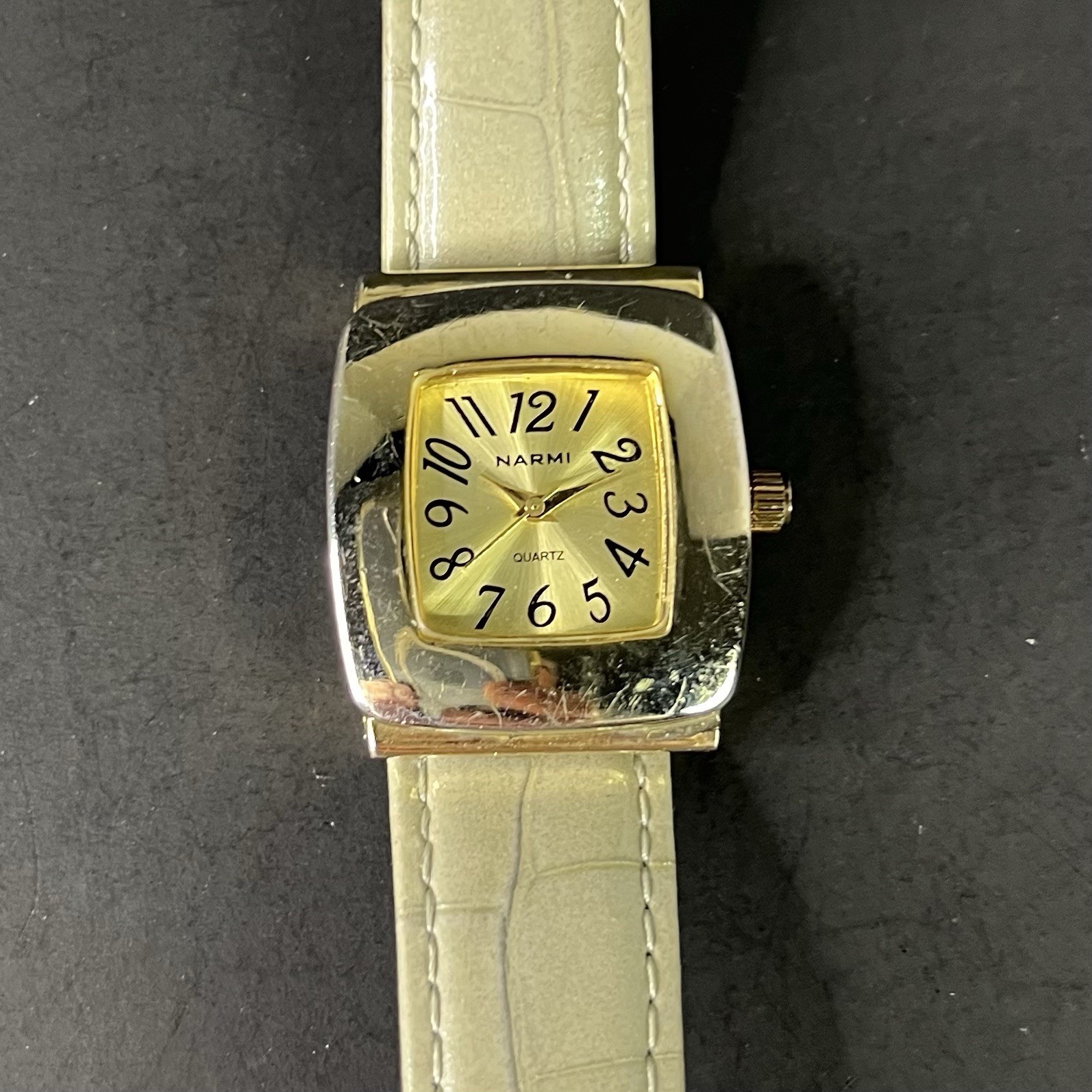 Narmi Women’s 28mm Square Silver Case Polished Bezel Gold Dial White Strap
