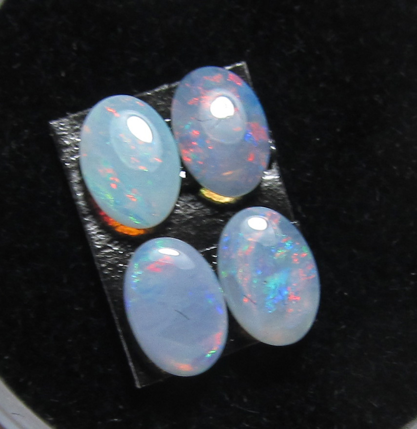 set of 4 solid semi-black opal, 6 x 4 mm, .74 carats, moderate color