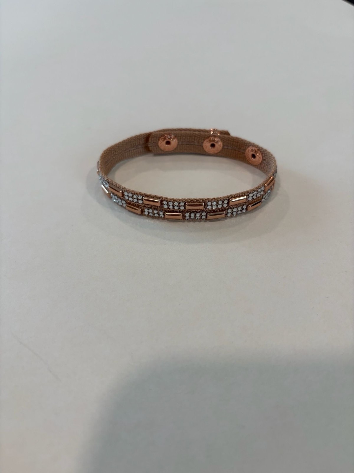 Set of 5 Rose Gold Tone Fashion Bracelets, a Ring and a Charm