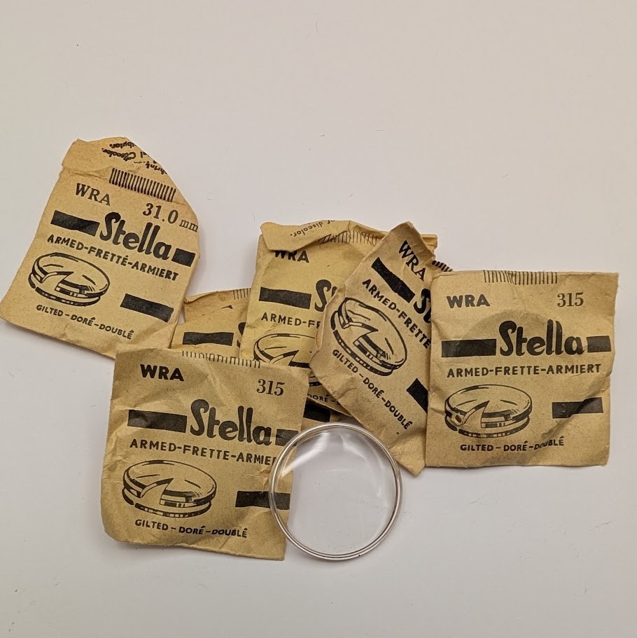 Stella Armored Gold Tension Ring Watch Crystal NOS Holland 26.8–32.7mm