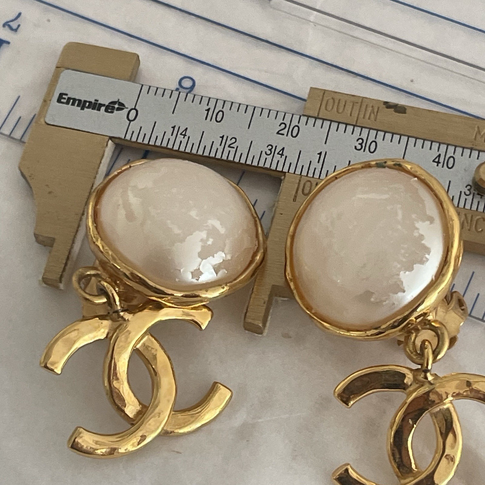 Auth. vtg CHANEL 1995 gold 3D CC logo dangle with round moonlight stone stamped