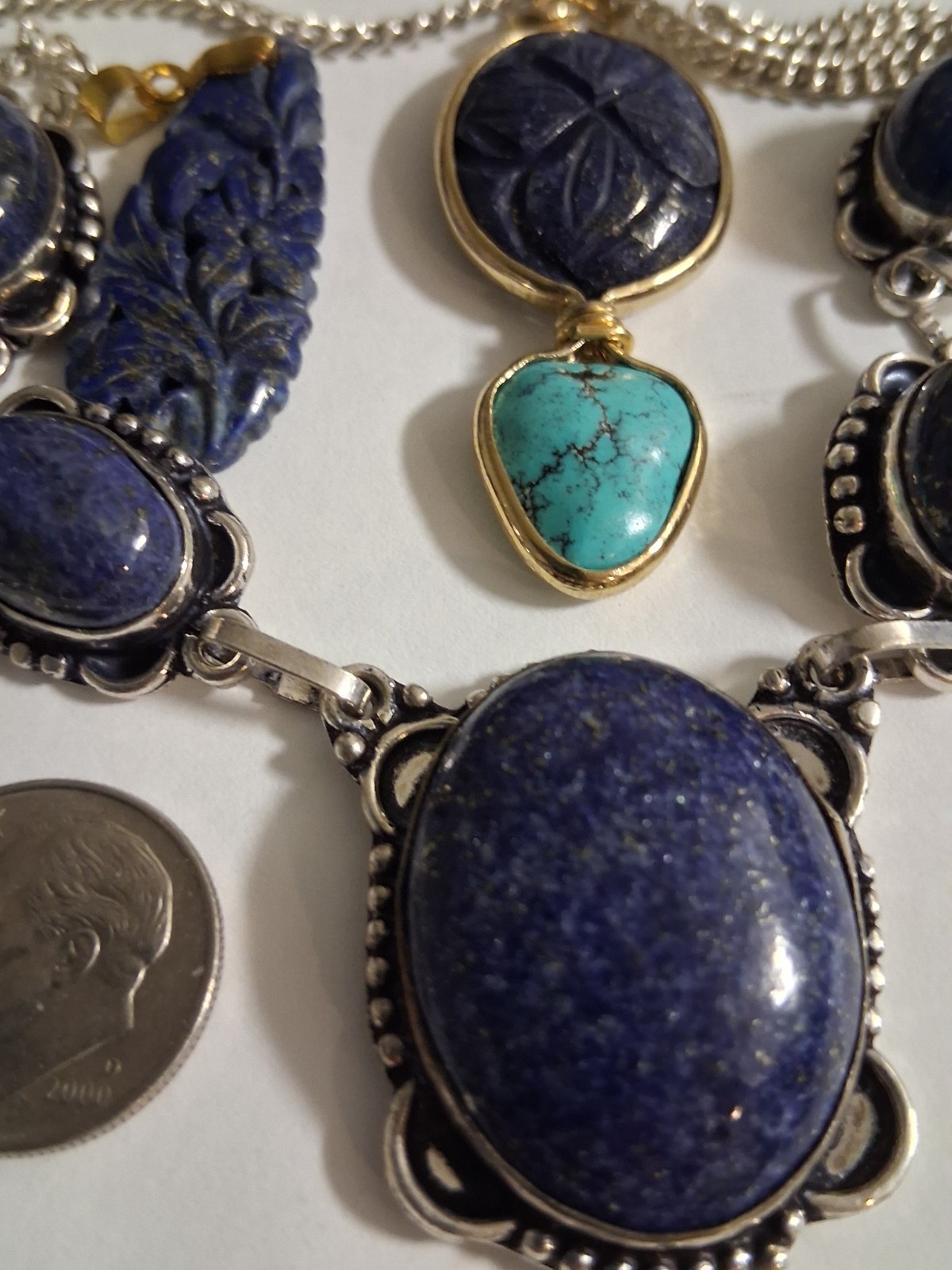 carved lapis lazuli gold filled pendants, sterling silver necklace, total 40g