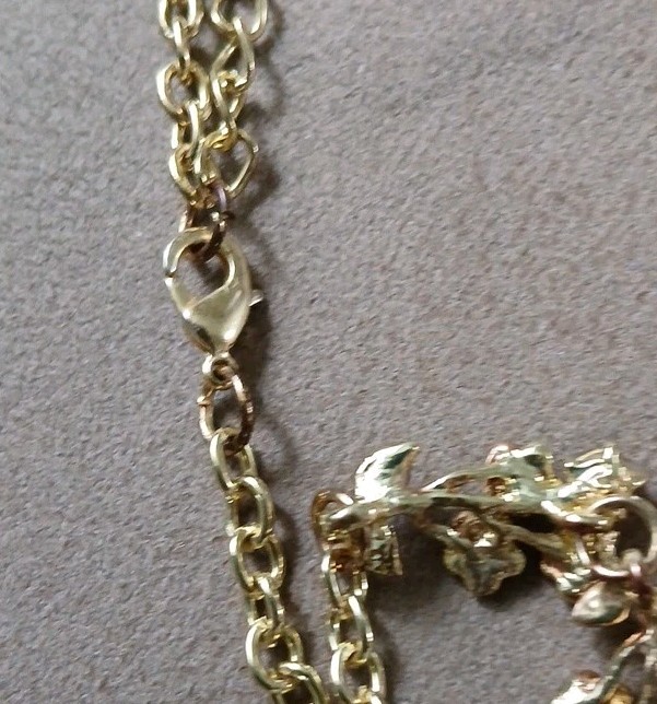 Bold Ladies Necklace Delicate Golden Flowers Surround Amber Rhinestones Runway
