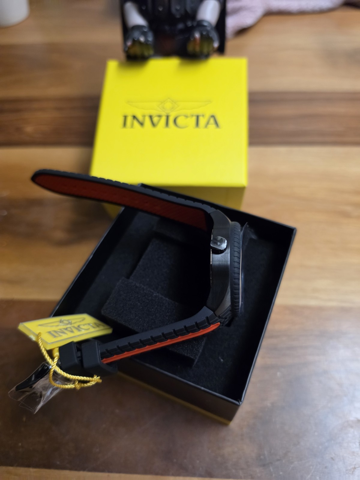 Invicta Men’s Sport Quartz Analog 50mm 50m Black/Red Dial Orange Strap Box