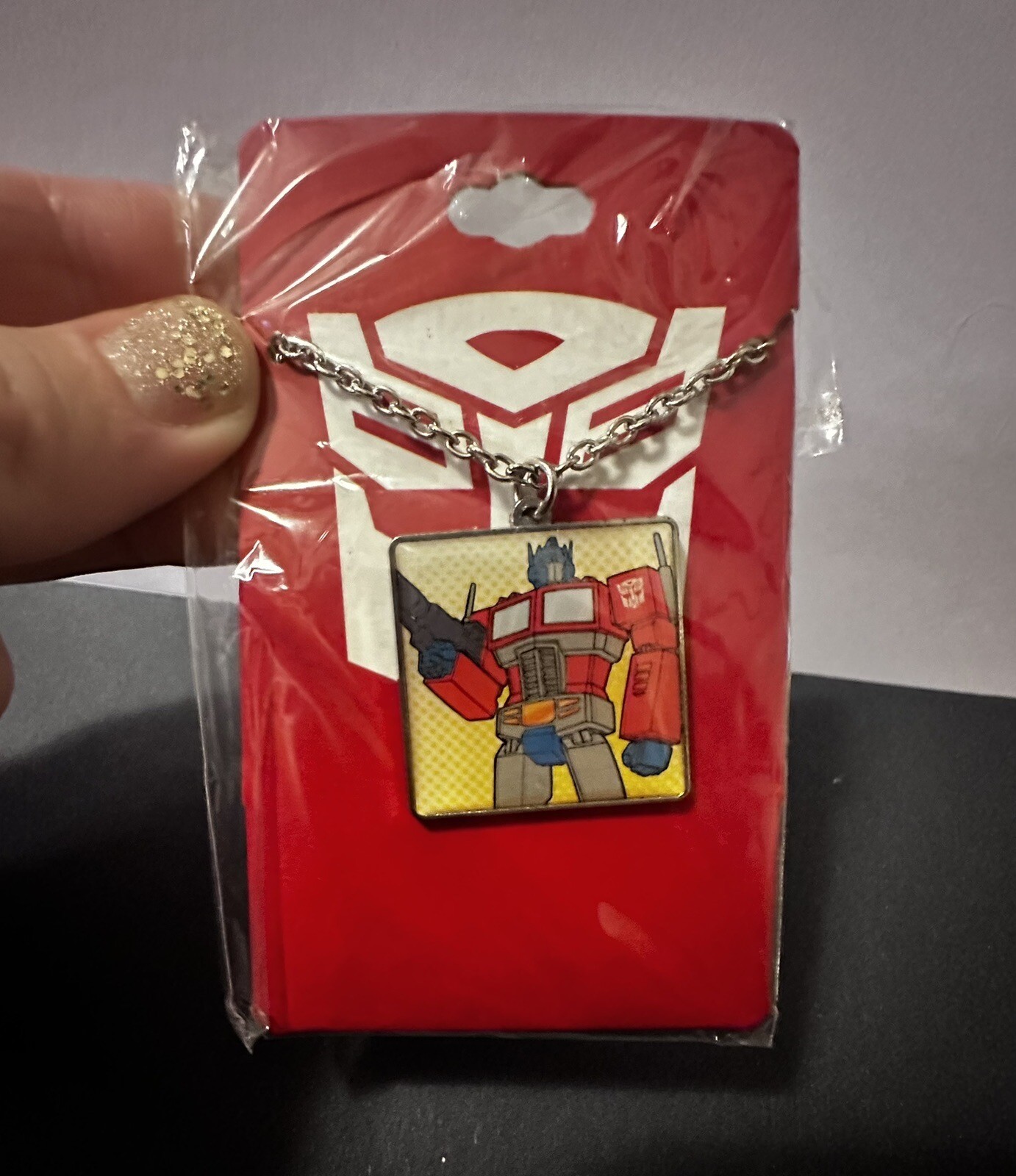 HasbroTransformers Optimus Prime 1.25” X 1.25” Sq. Pendant Necklace Brand New!