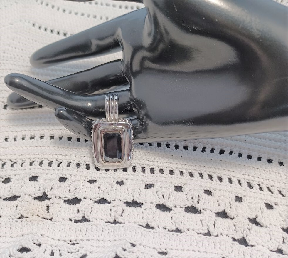 Black Faceted Glass and Silver Tone Pendant