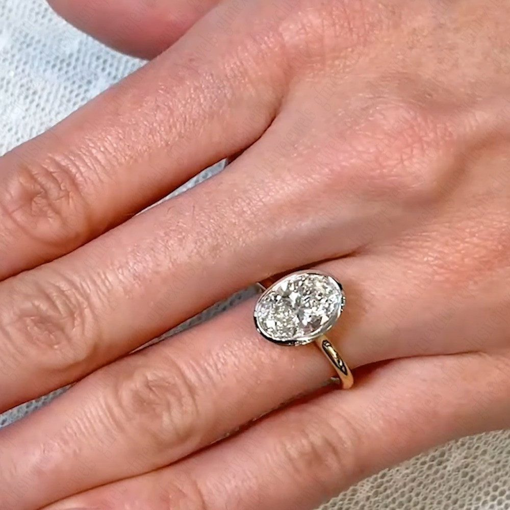 3.85Ctw Oval Moissanite Bezel Hidden Halo Engagement Ring In 14K Two-Tone Gold