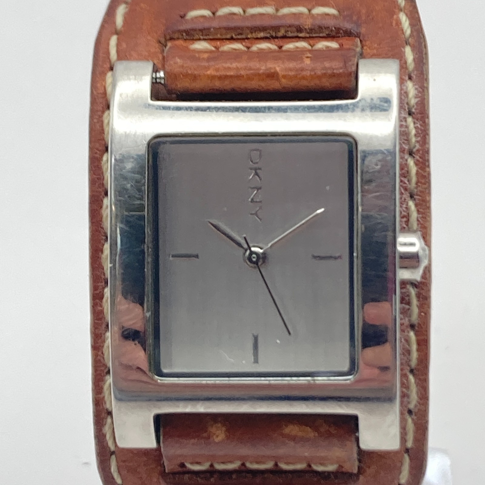 DKNY Women’s Watch 24mm Silver Tone Brown Leather Cuff 30M Tank New Battery 8″
