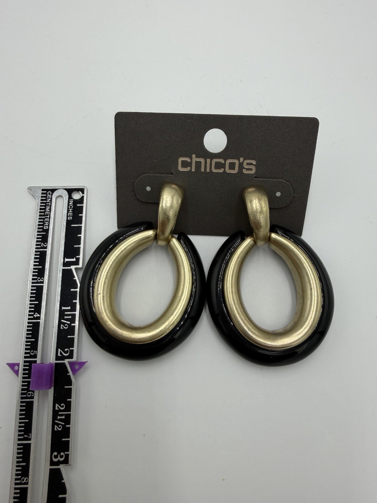 Chico’s black and gold-tone dangle hoop earrings New