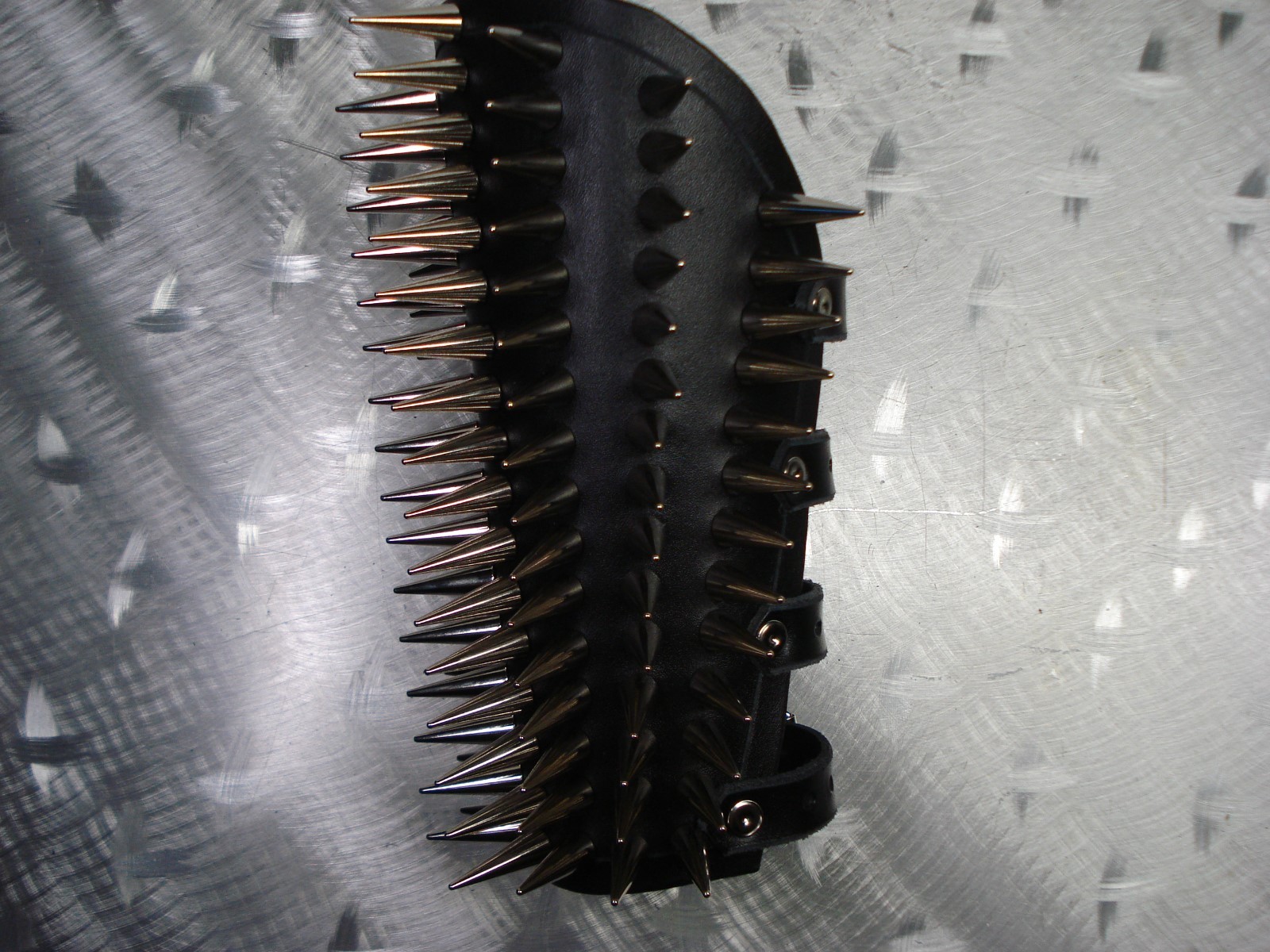 LEATHER SPIKED CONE GAUNTLET. BLACK METAL… (MDLG0231)….. BEHEXEN