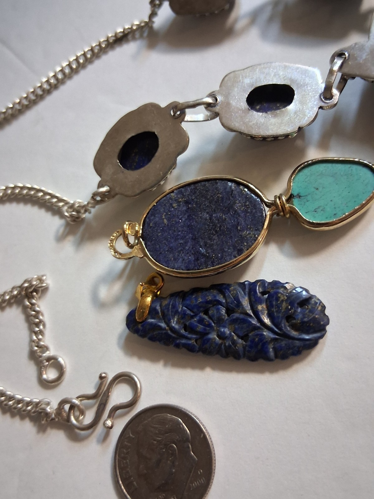 carved lapis lazuli gold filled pendants, sterling silver necklace, total 40g