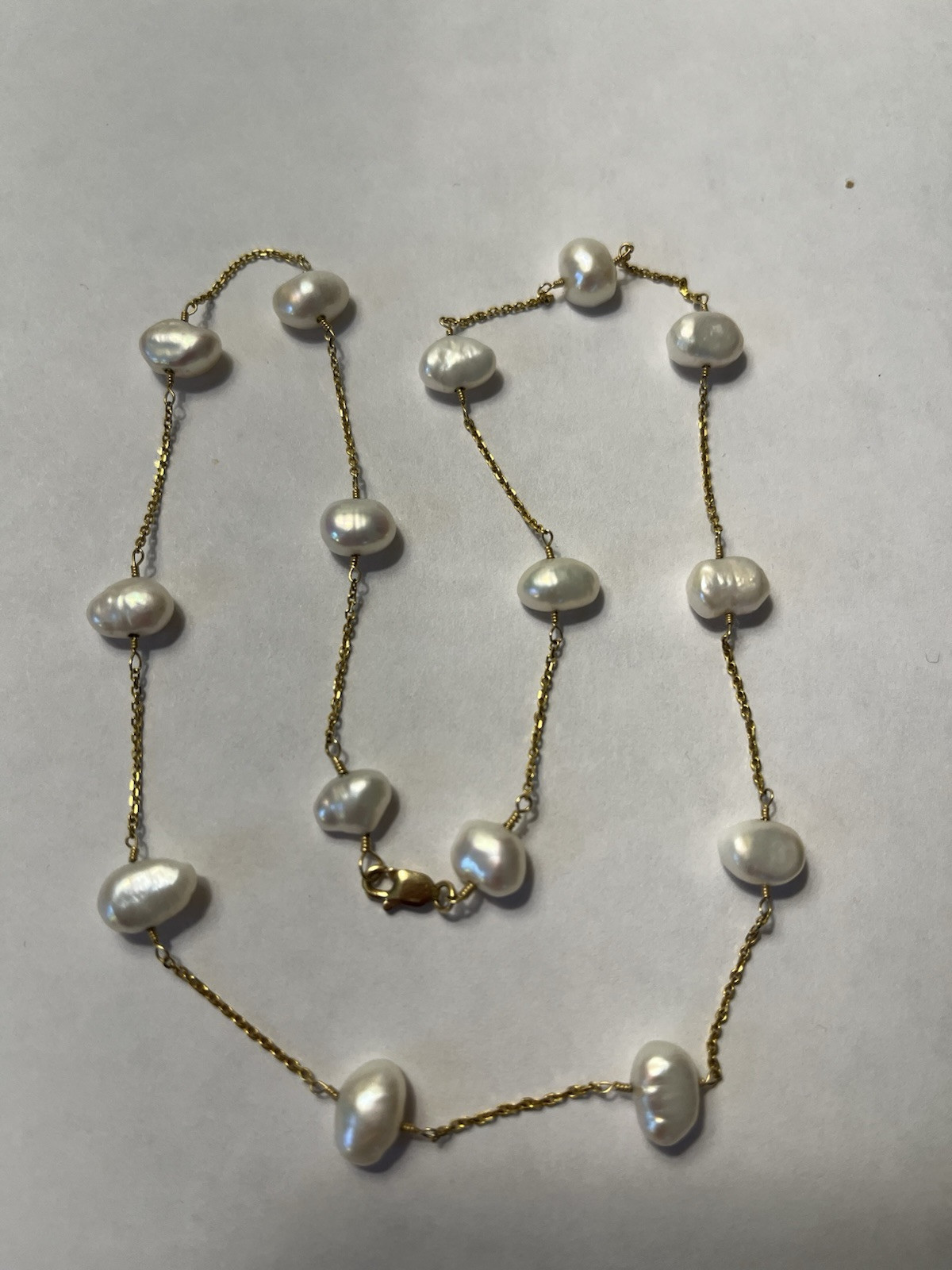 Stunning 14K gold 18″ pearl station necklace heavy 8.8 Grams.