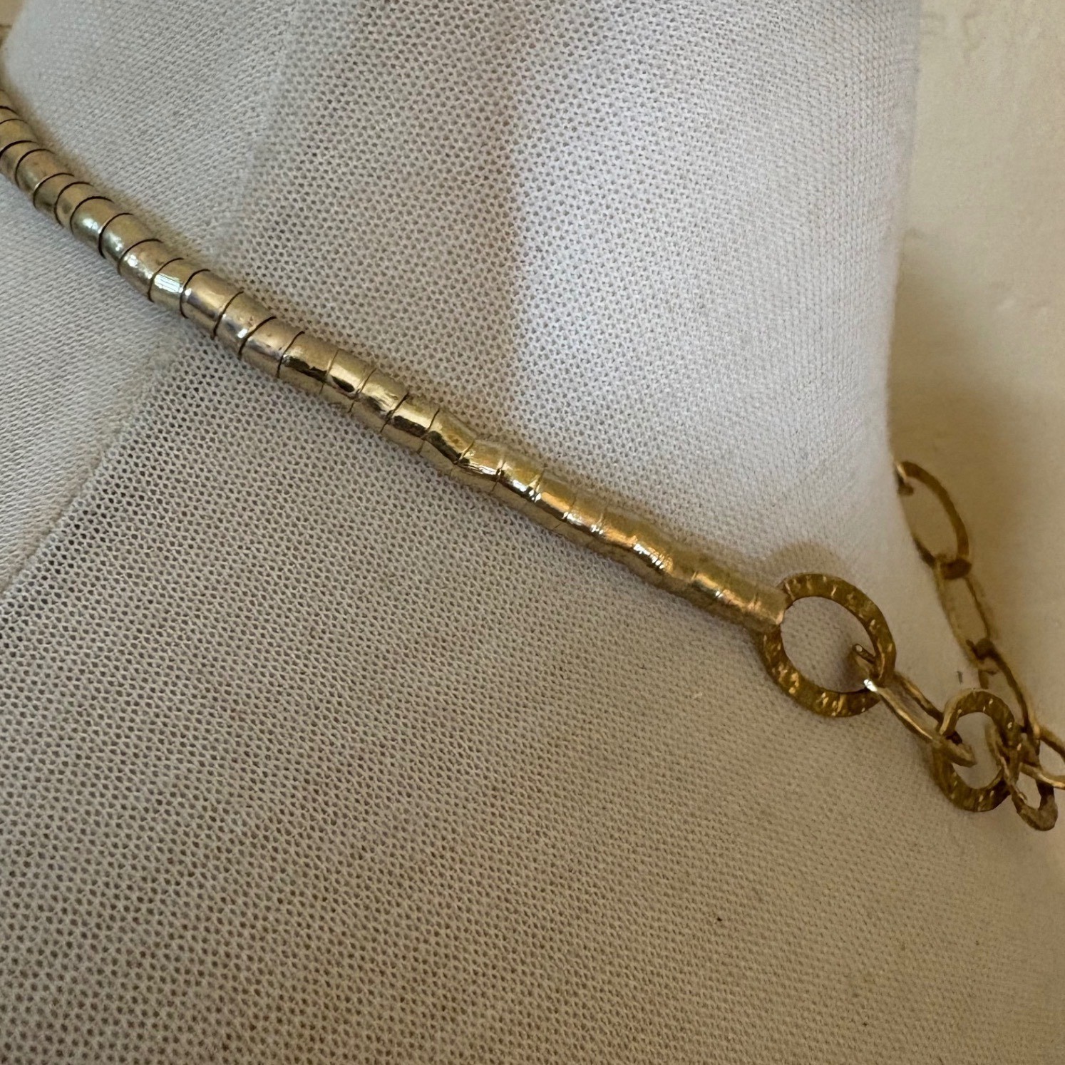 V Logo Gold Tone Hammered Oval Link Segmented Tube Statement Necklace