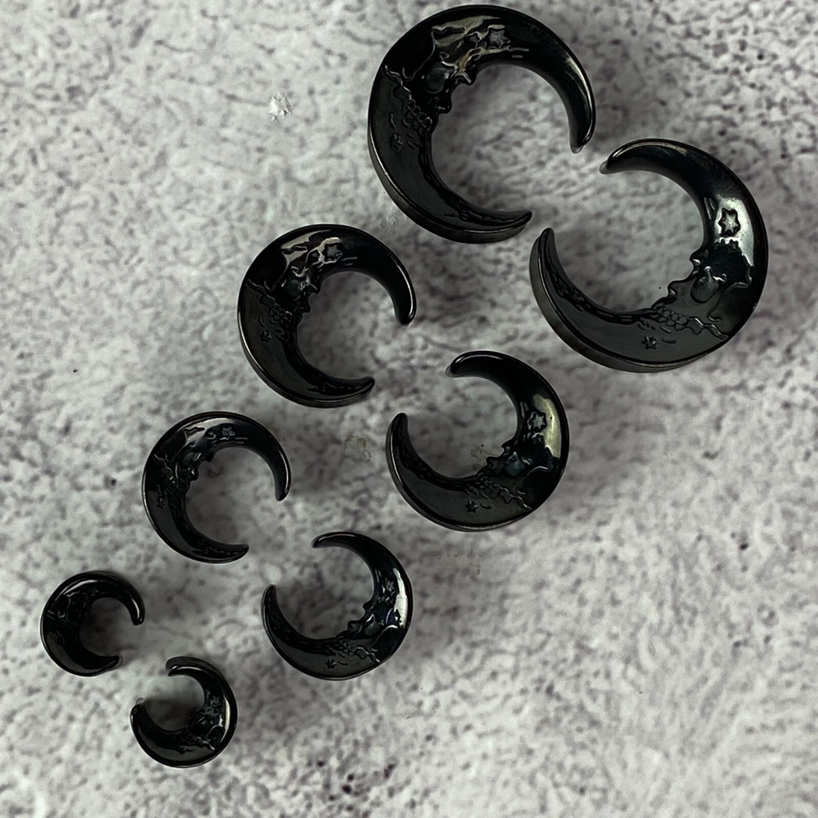 Pair of 316L Black Steel Saddles with Skull Faced Moon (PS-291, Black) gauges